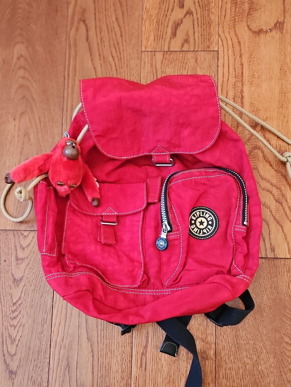 Kipling Red Nylon Drawstring Mini Backpack with Monkey Charm